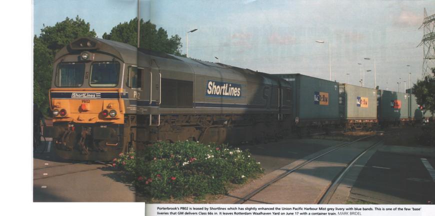 Porterbrook's PB02 is leased by Shortlines which has slightly enhanced the Union Pacific Harbour Mist grey livery with blue bands. This is one of the few 'base' liveries that GM delivers Class 66s in. It leaves Rotterdam Waalhaven yard on June 17 with a container train.